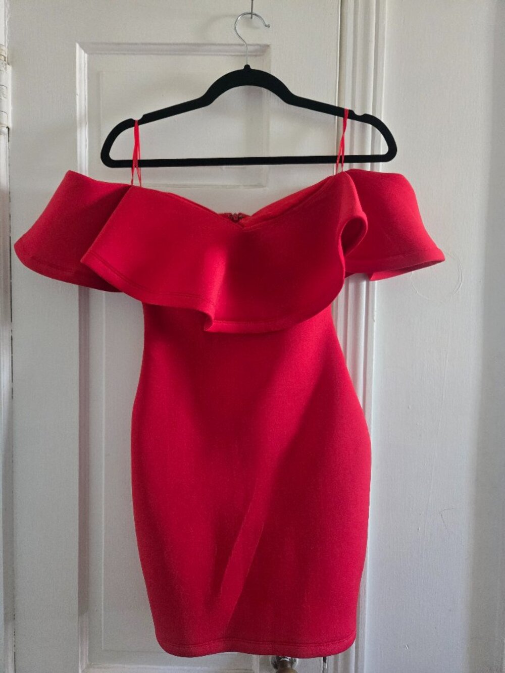Banjul Red off-the-shoulder bodycon dress with a ruffled neckline